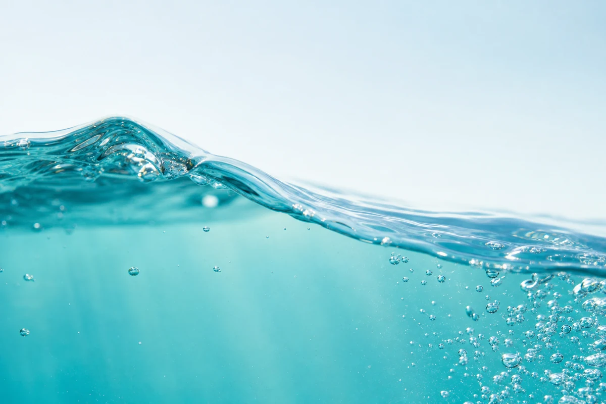 Clear water surface with air bubbles — activated carbon water treatment